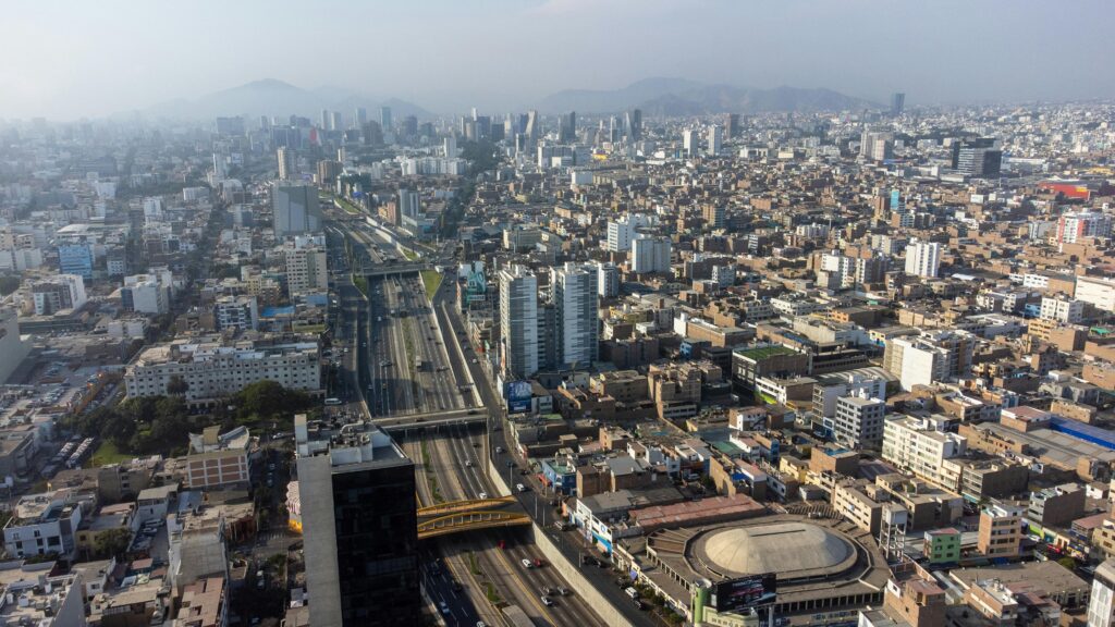 Expansive aerial view of Lima, showcasing its urban landscape and architecture in Callao Region.